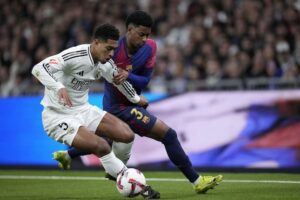 La Liga 2024/25: Jude Bellingham vs Alejandro Balde dalam laga El Clasico Real Madrid vs Barcelona di pekan 11 (c) AP Photo/Bernat Armangue