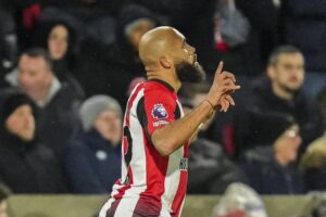 Pemain Brentford Bryan Mbeumo merayakan gol ke gawang Arsenal di Stadion Gtech Community pada laga Premier League, Kamis (2/1/2025) dini hari WIB. (c) AP Photo/Kirsty Wigglesworth